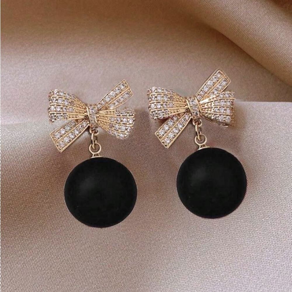Elegant Black and Gold Bow Earrings